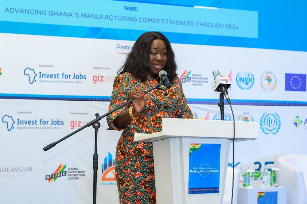 A speaker addresses the National Economic Zones Policy Roundtable on Ghana's manufacturing competitiveness