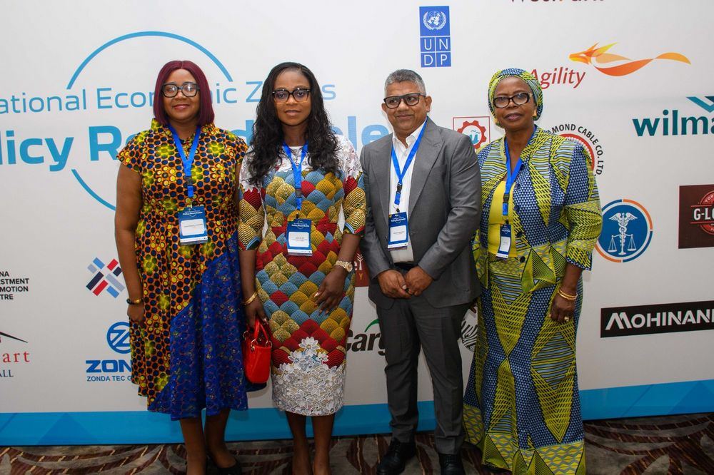Delegates pose at the National Economic Zones Policy Roundtable